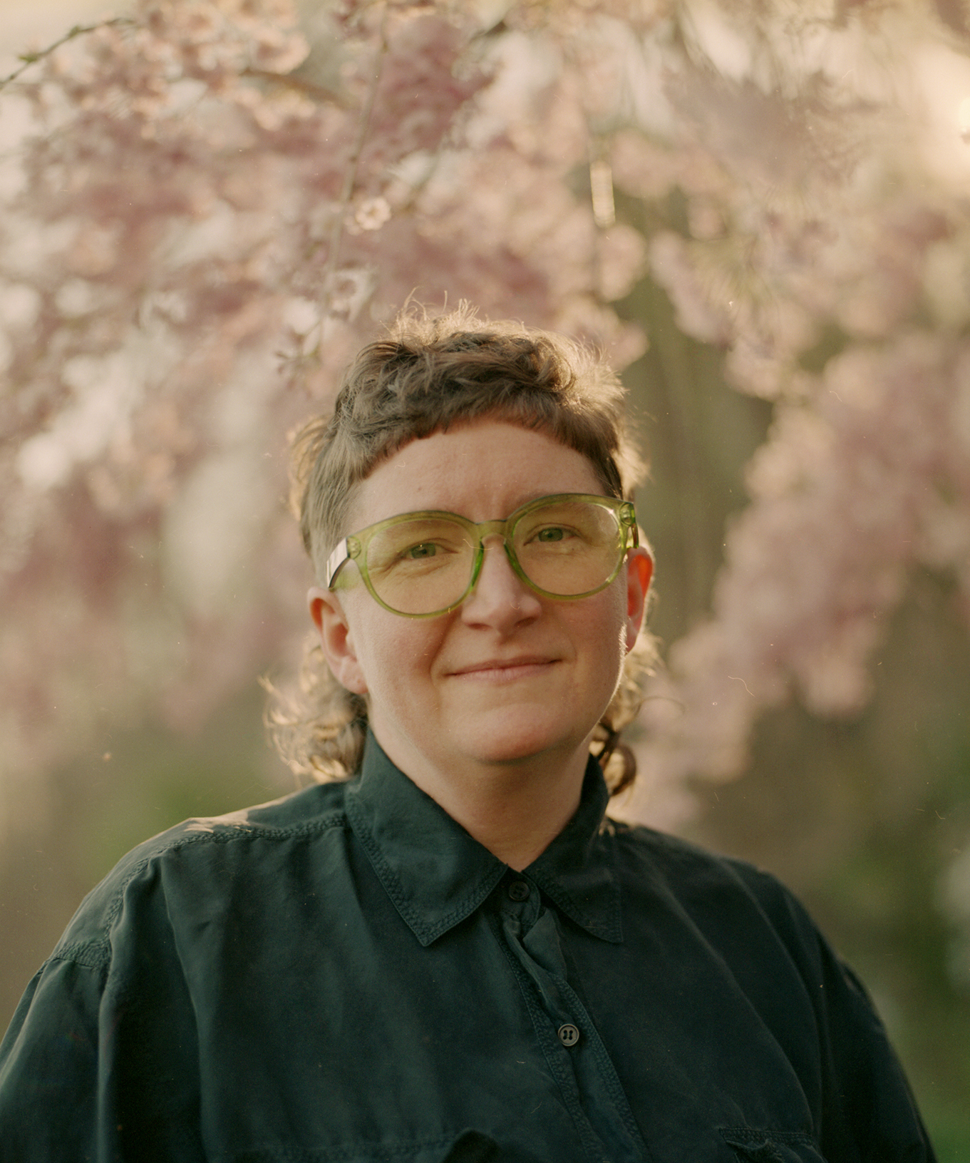 Chris Baker, author, under cherry blossoms